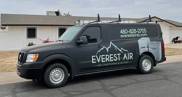 Branded service van from HVAC company, ready for residential HVAC maintenance and installation services.