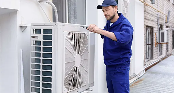HVAC technician performing emergency repair service in Reno, NV.